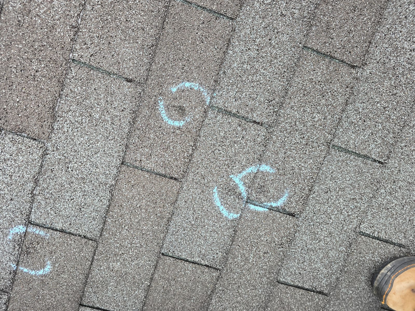 Hail damage on an Asheville, NC asphalt shingle roof